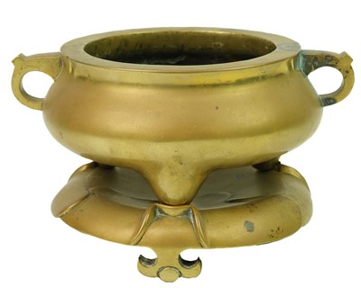 Lot 47 - A Chinese polished bronze censer on stand, Qing Dynasty.