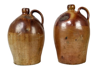 Lot 1228 - A salt glaze flagon Searle Wine & Spirit Dealer Crediton.