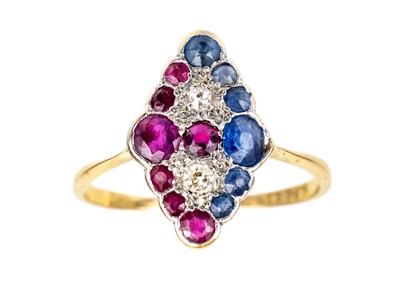 Lot 100 - An 18ct and platinum diamond, ruby and sapphire dress ring.