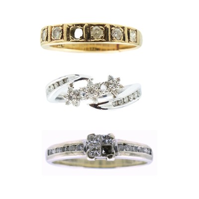 Lot 122 - A selection of three diamond set rings.