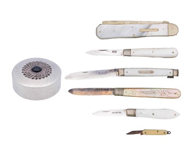 Lot 218 - A silver pill box, five mother-of-pearl pocket knives and a miniature celluloid pocket knife.