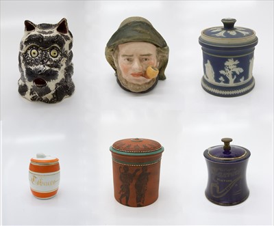 Lot 847 - Six pottery tobacco jars, including one in the...