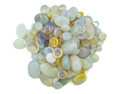 Lot 287 - A collection of loose cabochon white opals.