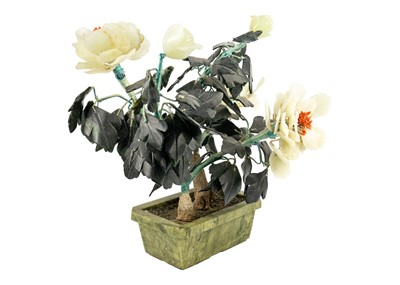 Lot 291 - A Chinese hardstone flowering plant, 20th century.