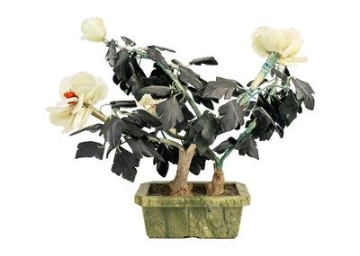 Lot 291 - A Chinese hardstone flowering plant, 20th century.