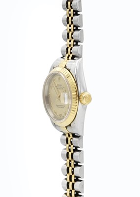 Lot 132 - ROLEX - A Rolex Oyster Perpetual Datejust lady's gold and stainless steel bracelet wristwatch.