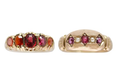 Lot 168 - Two early 20th-century 9ct garnet set rings.