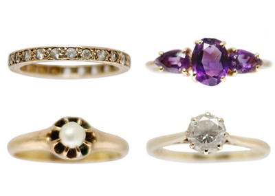 Lot 169 - A selection of four gem set rings.