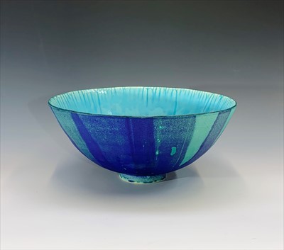 Lot 1042 - A large stoneware bowl with lapis blue and...