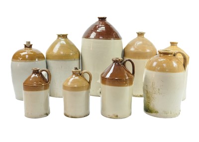 Lot 328 - A group of nine stoneware flagons.