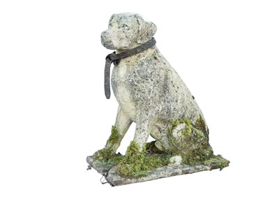 Lot 523 - A reconstituted stone Labrador.