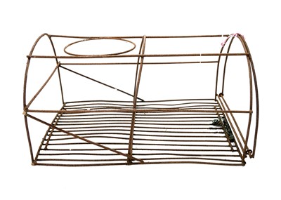 Lot 519 - Two wrought iron lobster pot frames.