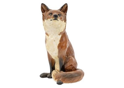 Lot 428 - A Beswick fireside figure of a fox.