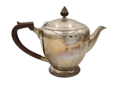 Lot 18 - A George VI silver ovoid pedestal teapot by Roberts & Belk Ltd.
