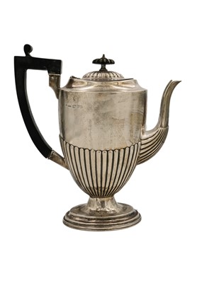 Lot 20 - A Victorian silver half fluted pedestal hot water jug by John Millward Banks.