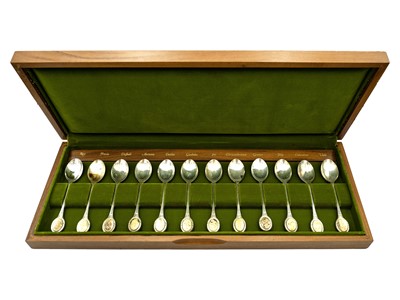 Lot 48 - A cased set of twelve silver royal horticultural society flower spoons.