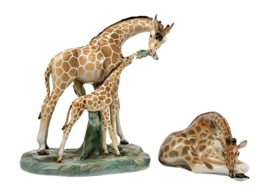 Lot 432 - A Ronzan Italian pottery figure group of a giraffe and calf.