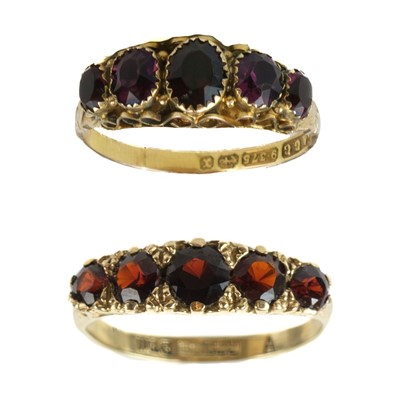 Lot 181 - Two 9ct garnet set five stone rings.