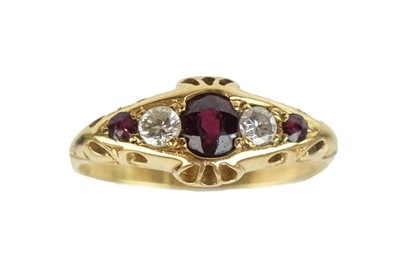 Lot 193 - An early 20th-century 18ct diamond and ruby five-stone ring.