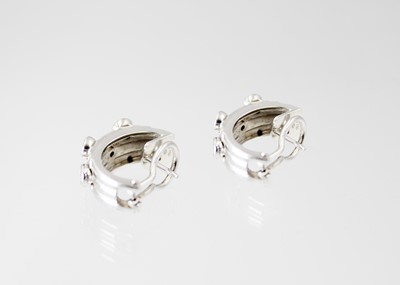 Lot 221 - Hans D. Krieger - A stunning pair of 18ct white gold diamond set earrings.