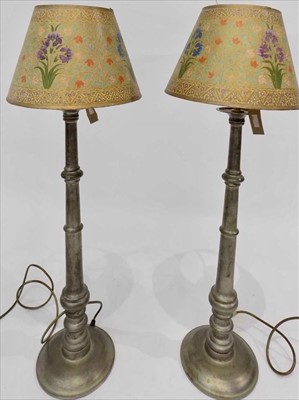 Lot 150 - A pair of silver coloured metal table lamps,...