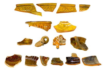 Lot 173 - A collection of post Medieval and later pottery shards.