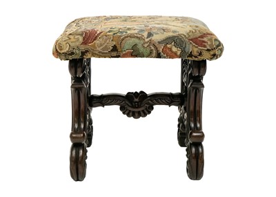Lot 39 - A continental walnut stool.