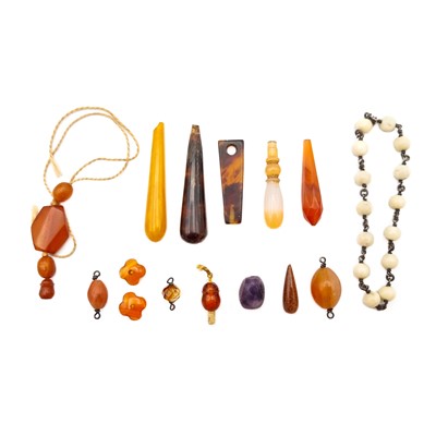 Lot 347 - A collection of loose amber beads.