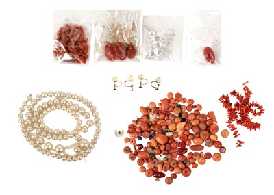 Lot 344 - A collection of loose coral pieces and beads.