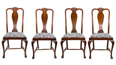 Lot 645 - A set of four oak Queen Anne style dining chairs.