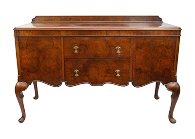 Lot 632 - An early 20th Century walnut sideboard.