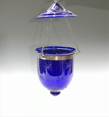 Lot 960 - A 20th century blue glass bell jar lantern...