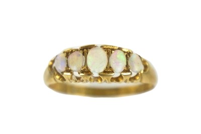 Lot 191 - An early 20th century 18ct opal set five-stone ring.