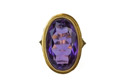 Lot 189 - A 9ct amethyst set cocktail ring.