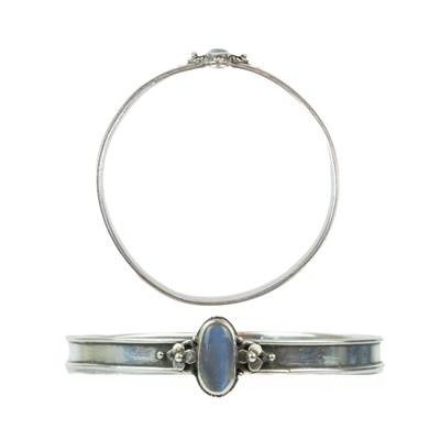 Lot 183 - A rare Gwen Whicker Arts & Crafts silver moonstone set bangle.