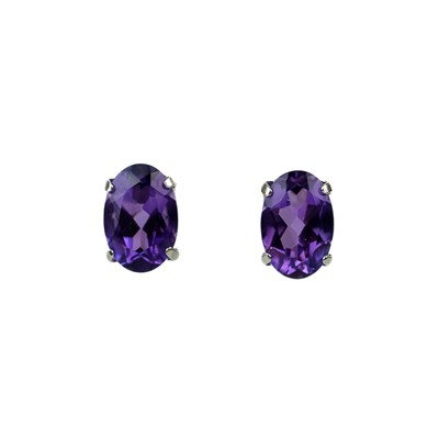 Lot 194 - A pair of platinum amethyst set stud earrings, and a pair of loose moissanite gems.