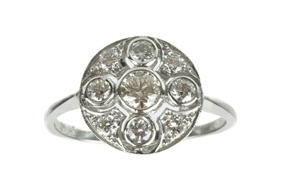 Lot 197 - An Art Deco platinum diamond set cluster ring.
