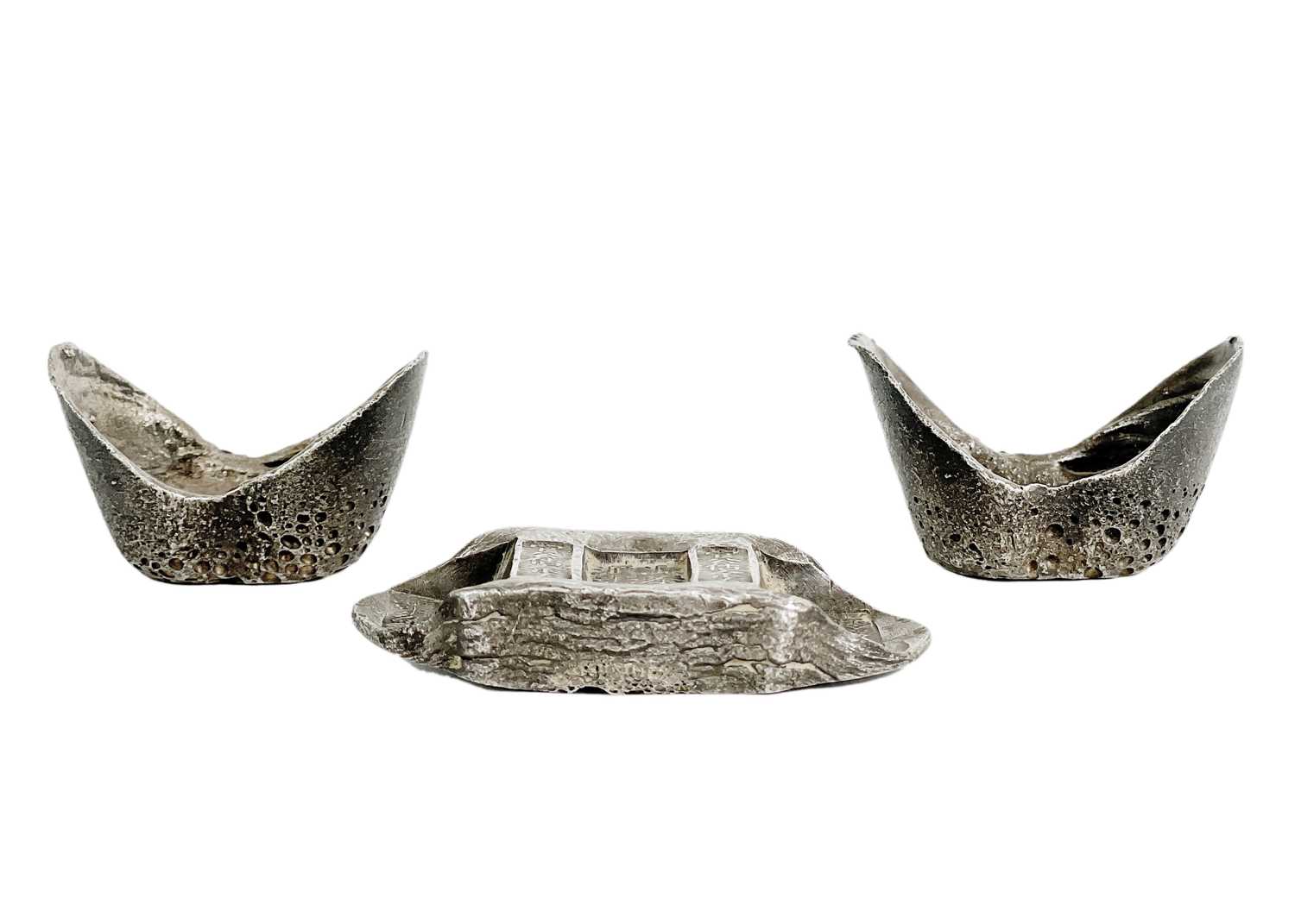 Lot 310 - Three Chinese silver ingots.
