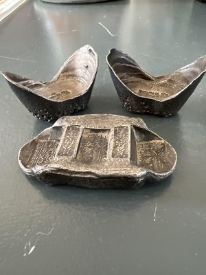Lot 310 - Three Chinese silver ingots.