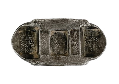 Lot 310 - Three Chinese silver ingots.