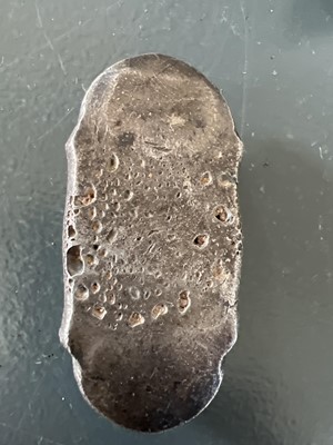 Lot 310 - Three Chinese silver ingots.