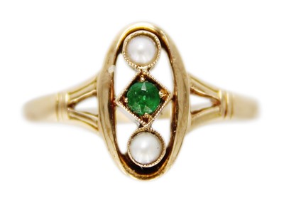 Lot 220 - A 14ct pearl and green stone set ring.