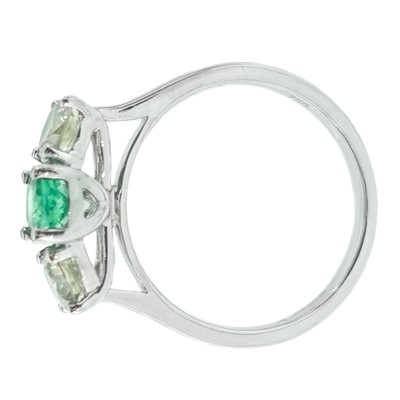 Lot 234 - A good 18ct white gold certified emerald and diamond three-stone ring.