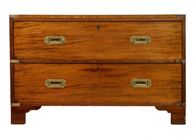 Lot 613 - A low campaign style chest of drawers.