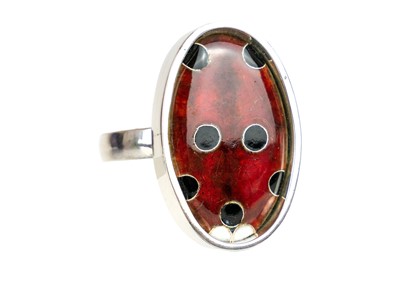 Lot 336 - A .999 silver, cloisonne and enamel "Ladybird" ring by Samantha Suddaby