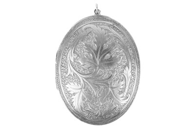 Lot 250 - A Victorian silver foliate scroll engraved locket pendant.