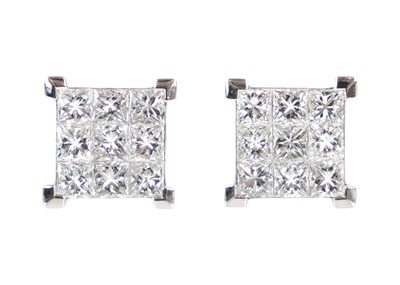 Lot 251 - An 18ct white gold pair of certified princess cut diamond square stud earrings.