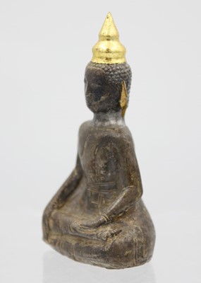 Lot 362 - A Chinese silver and wood Buddha, Qing Dynasty, 18th/19th century.