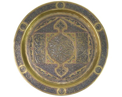 Lot 54 - A Cairoware silver inlaid brass tray, circa 1900.
