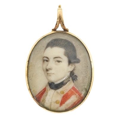 Lot 254 - A George III gold-mounted ivory portrait miniature glazed pendant of a young British officer.